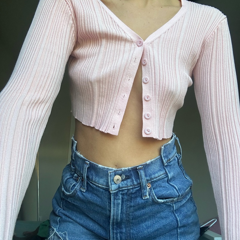 light pink form fitting sweater